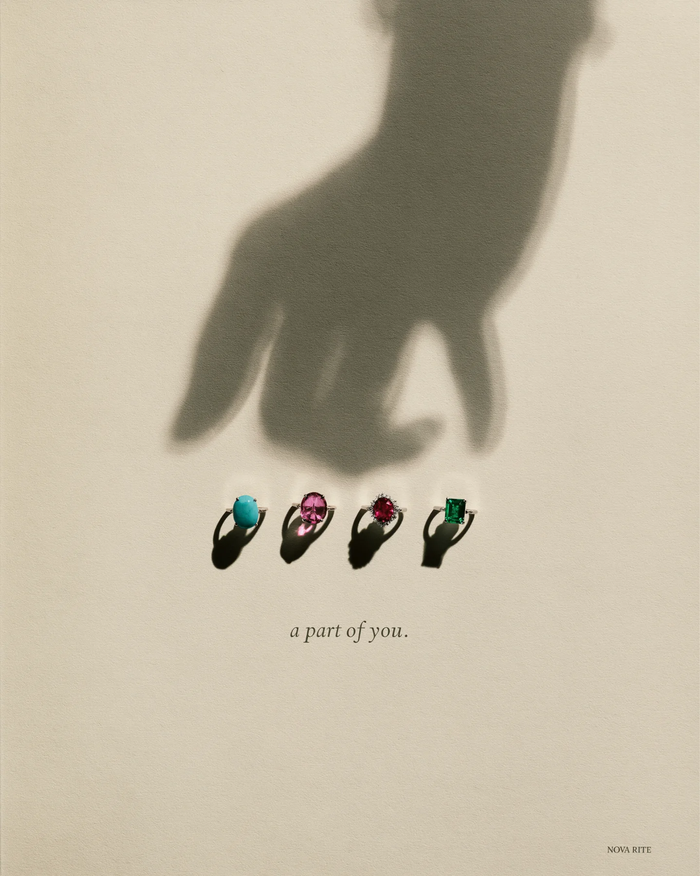 Jewelry campaign poster with four gemstone rings arranged in strong shadow