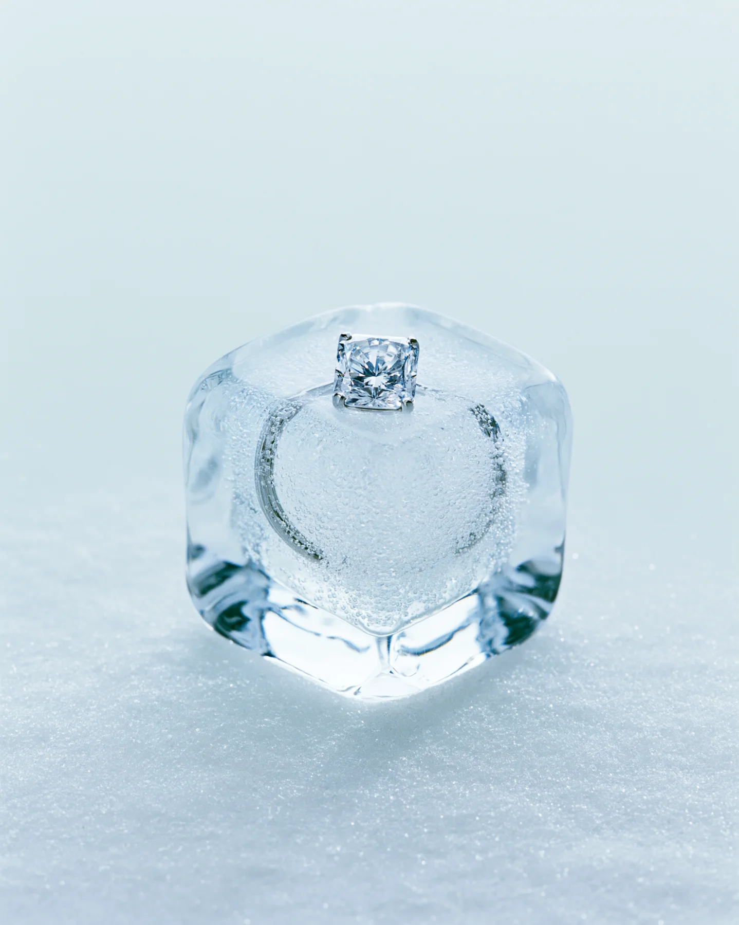 Diamond ring campaign image frozen in ice with cold blue light